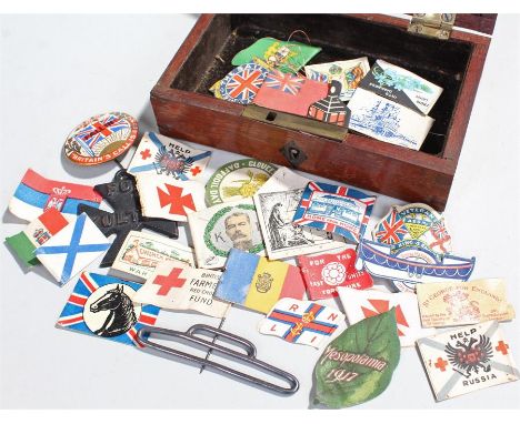A collection of mostly World War One charity lapel pins to include Kitchener "do not forget my boys", Kensington war hospital