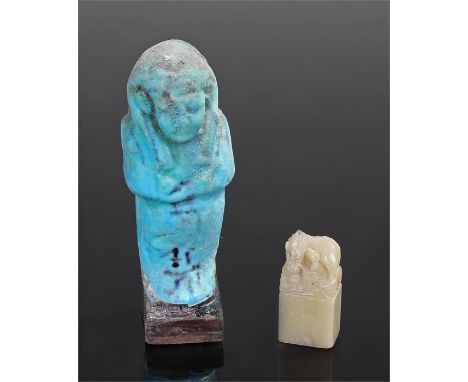 Chinese jade seal, carved with a reclining beast on a rectangular base, 4.3cm high, together with an Egyptian Ushabti in turq