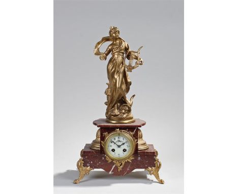 19th Century French gilt spetler and marble mantel clock, the clock surmounted by a classical figure above the stepped marble