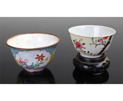 Two Chinese tea bowls to include an enamel, possibly Canton, example decorated with flowers and a yellow and green border, an