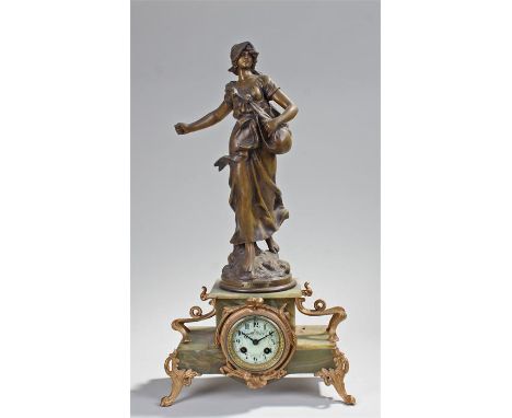 19th Century French gilt spetler and onyx mantel clock, the clock surmounted by a figure above the stepped marble base and br