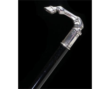 White metal walking stick, the top surmounted with an arched horses leg and hoof, 88cm long