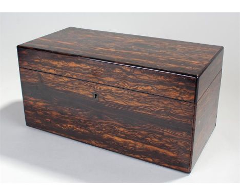 Victorian coromandel tea caddy, the hinged top opening to reveal two tea compartments and a central bowl reservoir, 33cm long