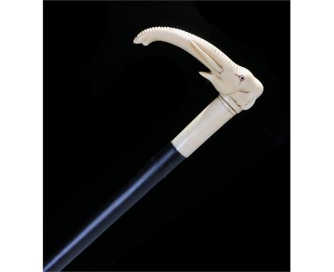 Victorian Ebony walking stick  with a carved ivory handle in the form of an elephant. Length 90.5cm