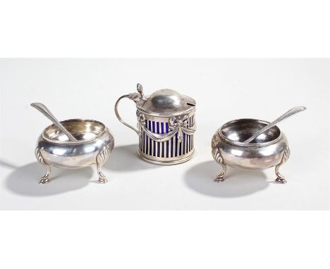 Two silver salts with spoons, the salts with three legs with shell shoulders and hoof feet, Sheffield 1829 maker FBS Ltd to i