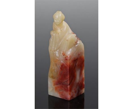 Chinese jade seal, carved as a scholar above the rectangular base, 7cm high