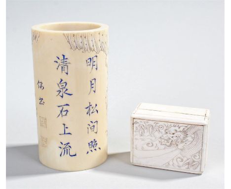 19th Century Chinese ivory cylinder/brush pot carved with a rocky landscape, houses, trees and with a river. Calligraphy to t