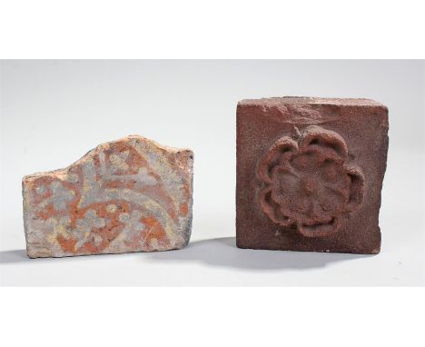Two Tiles, a 13th Century fragment of slip inlaid tile and a 16th Century with a Tudor rose in the centre. 10.5cm square 
