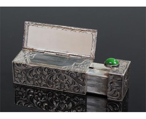 Lipstick case with sprung mirror silver marked 800, with foliate engraving possibly a jade button to enable opening and a mir