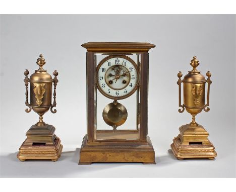 Victorian fur glass mantel clock, with a cream enamel dial and Arabic hours, twin train movement striking on a bell, together