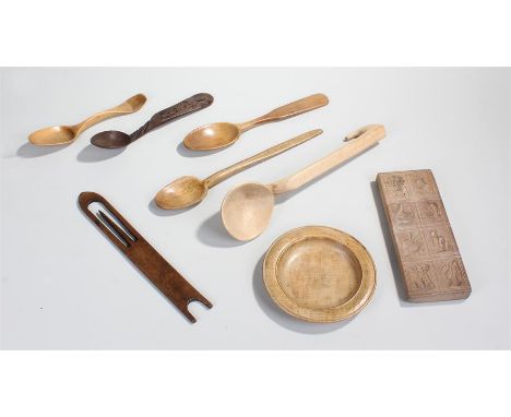 Collection of kitchen treen including serving spoons, ladle, condiment bowl and sugar mould, (8)