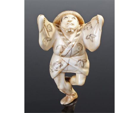 19th century Japanese ivory netsuke of a dancing actor standing on one leg and gazing upwards with his arms raised, his coat 