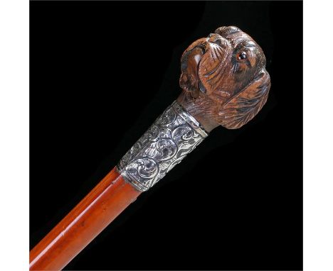 Victorian carved dog head walking stick with articulated lower jaw, silver collar Birmingham 1885 with previous owner name. L