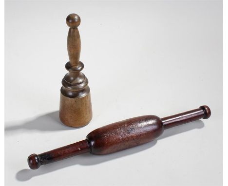 Two household implements to include a turned wooden potato masher height 28cm and an early rolling pin 