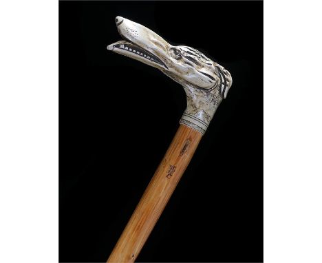 Walking stick with a resin greyhound handle with inlaid eyes. Length 93cm 