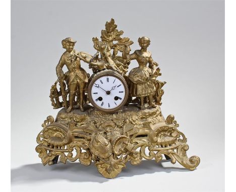 19th Century gilt spelter figural clock, with a hunter and his wife above a C scroll and weapon motif, the white enamel dial 