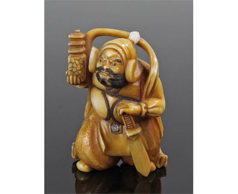 Japanese Meiji period ivory netsuke, carved as a samurai with his hand resting upon his sword, signed to the base, 4.5cm high