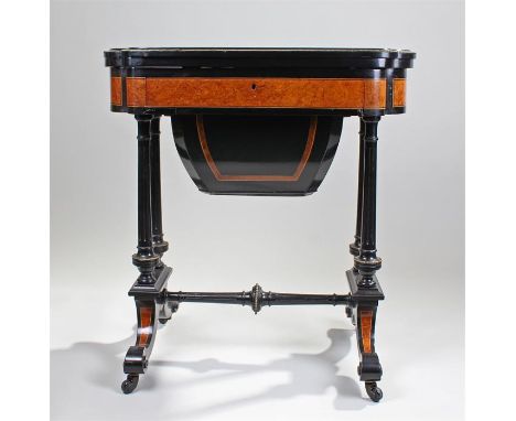 Fine Victorian ebonised and burr maple games table, the shaped inlaid rectangular top enclosing a chess board and cribbage bo