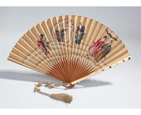19th Century Japanese fan with wooden stick and ivory guards. the guards decorated with insects in relief. The leaf decorated