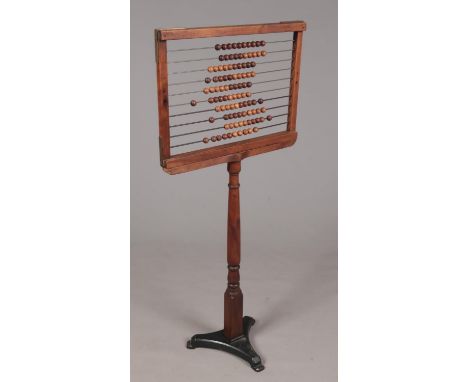 A Victorian school abacus. With turned column and cast iron tripod base.  