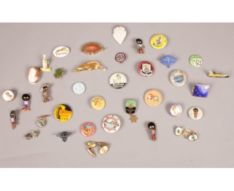 A collection of metal/enamel badges. Bisto, Esso Extra, Richmond sausages examples etc.  