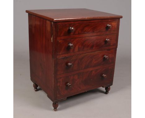 A Georgian mahogany commode chest.  