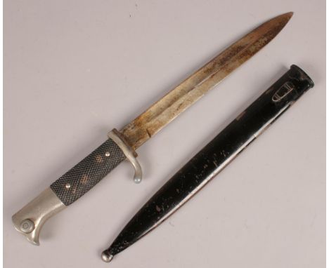 A WWII German bayonet stamped WKC with scabbard.  Blade pitting.