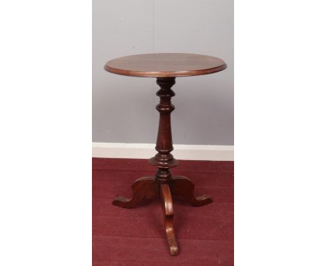 A mahogany tripod side table. (71cm height 47cm width)  