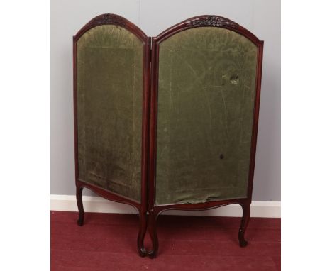 A Mahogany carved and framed two panelled screen. Comprising of a decorative green material on each panel. H: 110cm, W: each 