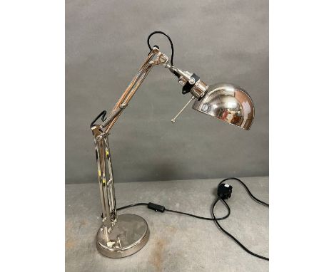An Anglepoise lamp 