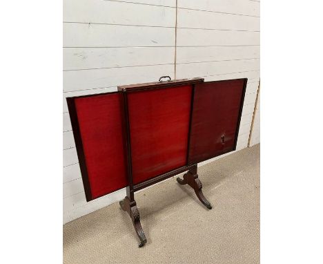 A mahogany fire screen 