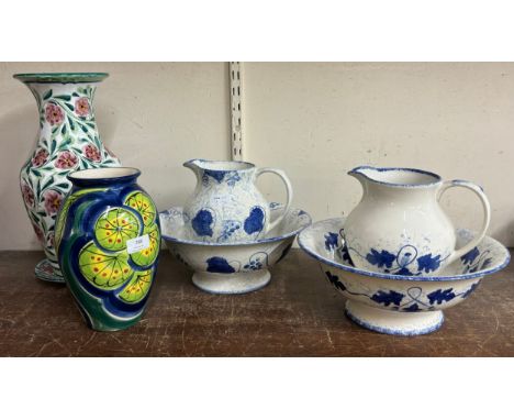 Two blue and white wash jugs and bowls including Poole Pottery and two Studio Pottery vases and a dish 