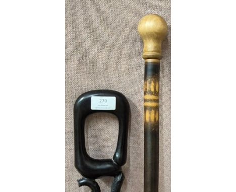An African ebony walking stick and one other 