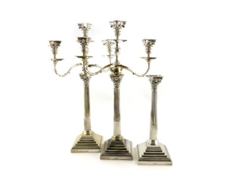 A pair of Edwardian silver three-light candelabra, by James Dixon and Sons, Sheffield 1909, Corinthian column form, central d