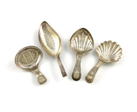 A collection of four George III silver caddy spoons, comprising: one by Peter and Ann Bateman, London 1795, fluted heart-shap