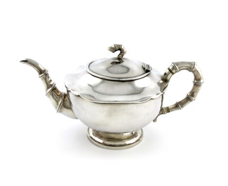 λA Chinese silver tea pot, by Wang Hing, circa 1920, circular form, simulated bamboo spout and scroll handle, with ivory insu