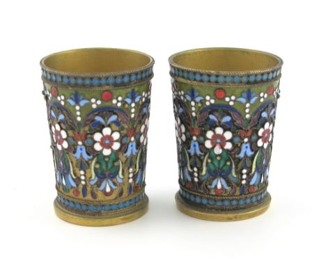 A pair of Russian silver-gilt and enamel beakers, 1896-1908, also marked with a French import mark, tapering circular form, w