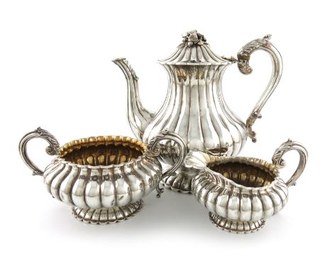 λA three-piece George IV silver coffee set, by Joseph Angell, London 1829, baluster and circular fluted form, leaf capped scr