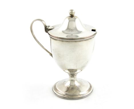 A George III silver mustard pot, by Peterson and Podio, London 1786, plain vase form, domed hinged cover with a ball finial, 