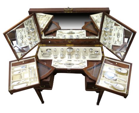 A lady's silver-mounted dressing table set, by Mappin and Webb, London 1912/13, the pieces initialled BMM,  comprising: a car