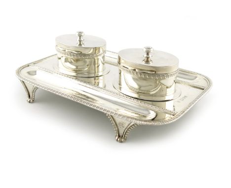 A late-Victorian silver inkstand, by Charles Stuart Harris, London 1900, rounded rectangular form, with two pen wells, gadroo
