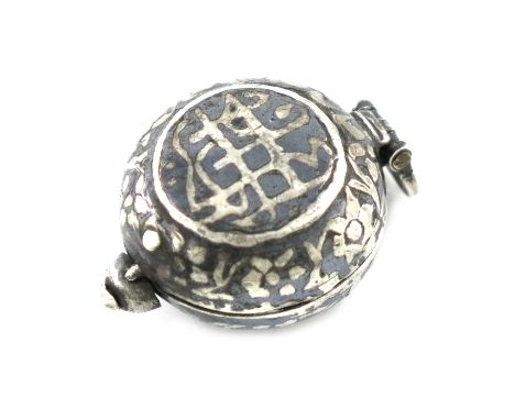 A Middle Eastern silver and niello work Qibla compass, unmarked, probably 19th century, the pointing arrow modelled as a bird