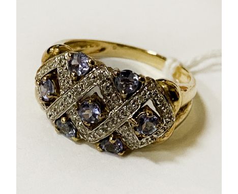 9CT GOLD TANZANITE &amp; DIAMOND DRESS RING CONSISTING OF 7 ROUND BRILLIANT CUT TANZANITE &amp; 34 ROUND BRILLIANT CUT DIAMON