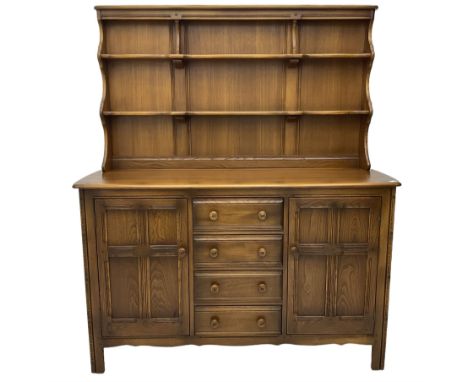 Ercol - medium elm dresser, plate rack over four drawers and two cupboardsDimensions: Height:&nbsp;170cm&nbsp; Length/Width:&