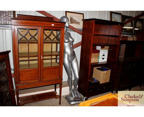 A silver coloured mannequin 