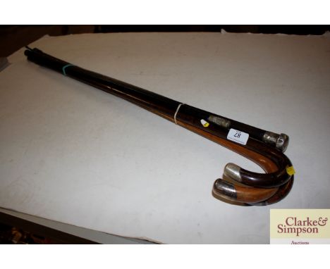 A silver handled walking stick, a Suffolk swagger stick, riding crop etc.