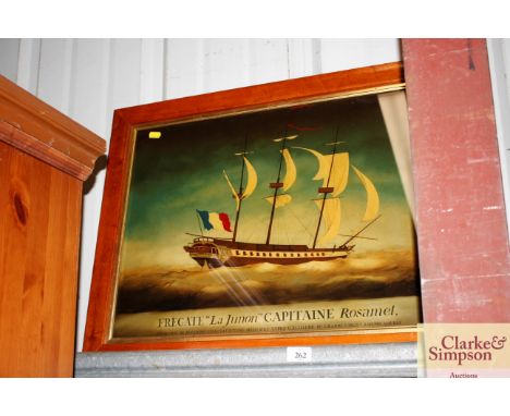 A coloured glass print of a battleship in simulated birds eye maple frame 