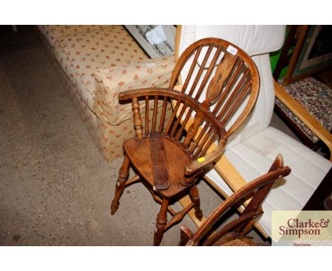 An elm stick and wheelback child's correction chair  AF