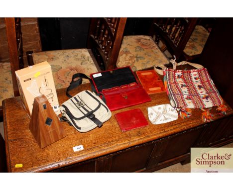 A boxed Metronome; a quantity of vintage purses etc.