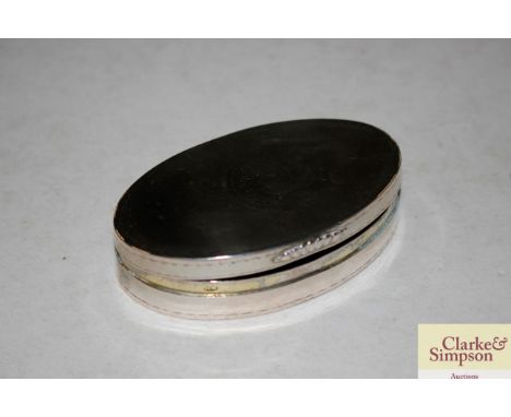 A continental white metal oval snuff box